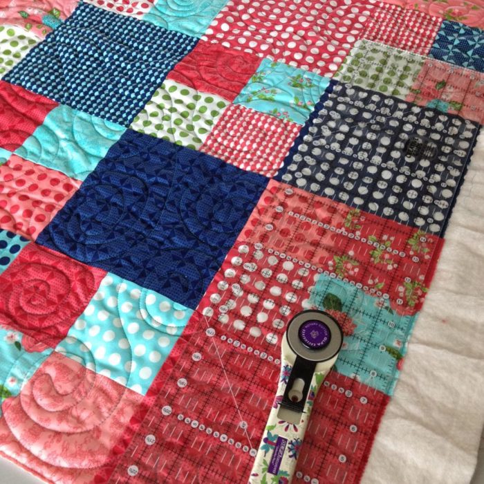 Trimming another @fatquartershop @lellaboutique #gooseberryfabrics #layercakecheckmatequilt happy Thursday! 