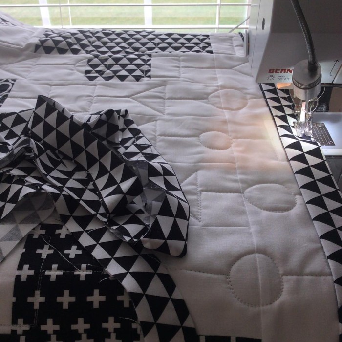 First project of the day - binding #blackandwhite #purnerbaby @simplesimonandco love the quilting! Thanks Gayle! Happy Monday! #lovemylife