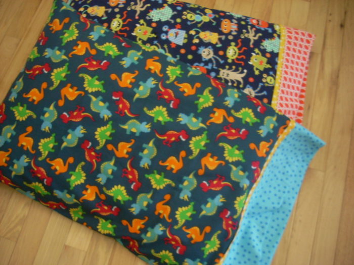 monster and dinosaur pillowcases for Cedar