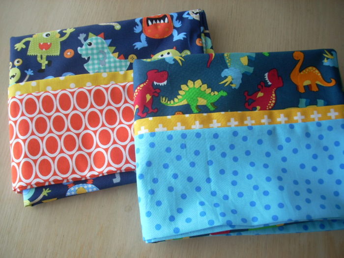 monster and dinosaur pillowcases for Cedar