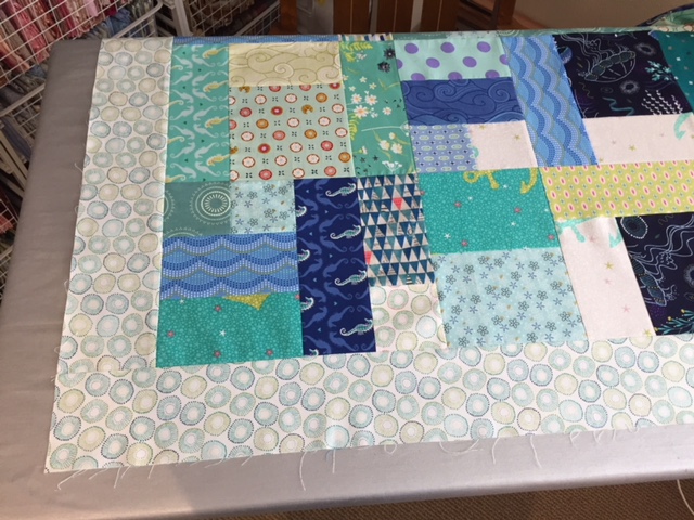 blue and green quilt top